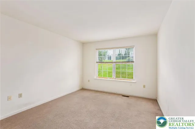 an empty room with a window