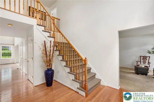 a view of entryway with wooden floor