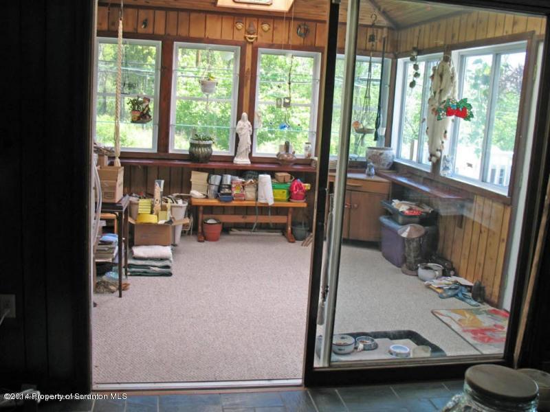 102 Griffin Road Moscow, PA 18444 - Photo 9 of 11 a room with furniture and a window