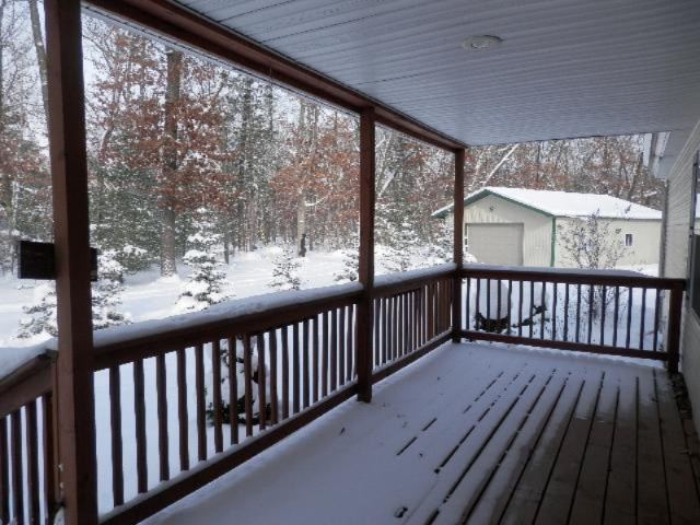 923 North Baker Road Wellston, MI 49689 - Photo 22 of 30 Beautiful covered front porch