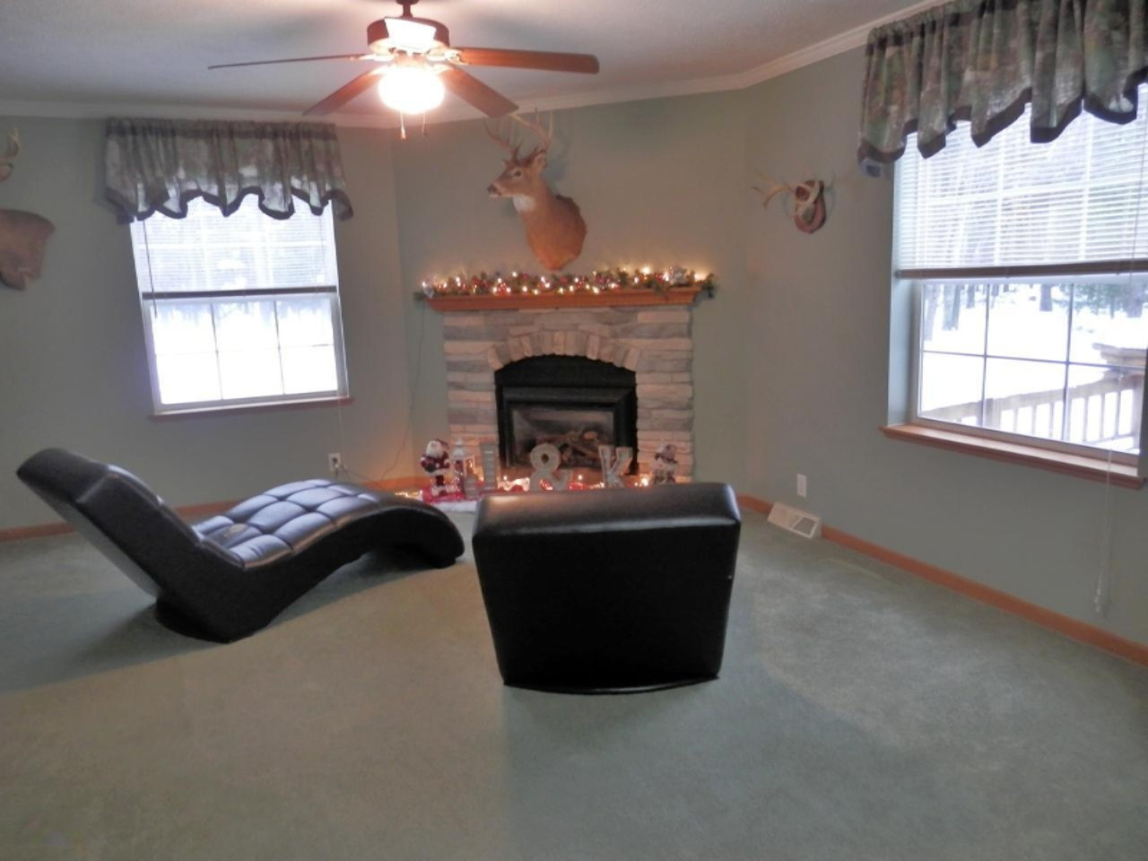 923 North Baker Road Wellston, MI 49689 - Photo 8 of 30 Family room with gas fireplace