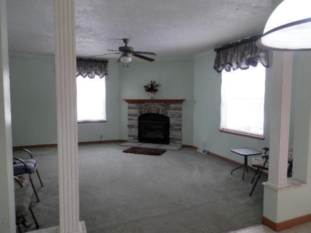 923 North Baker Road Wellston, MI 49689 - Photo 9 of 30 View of family room empty