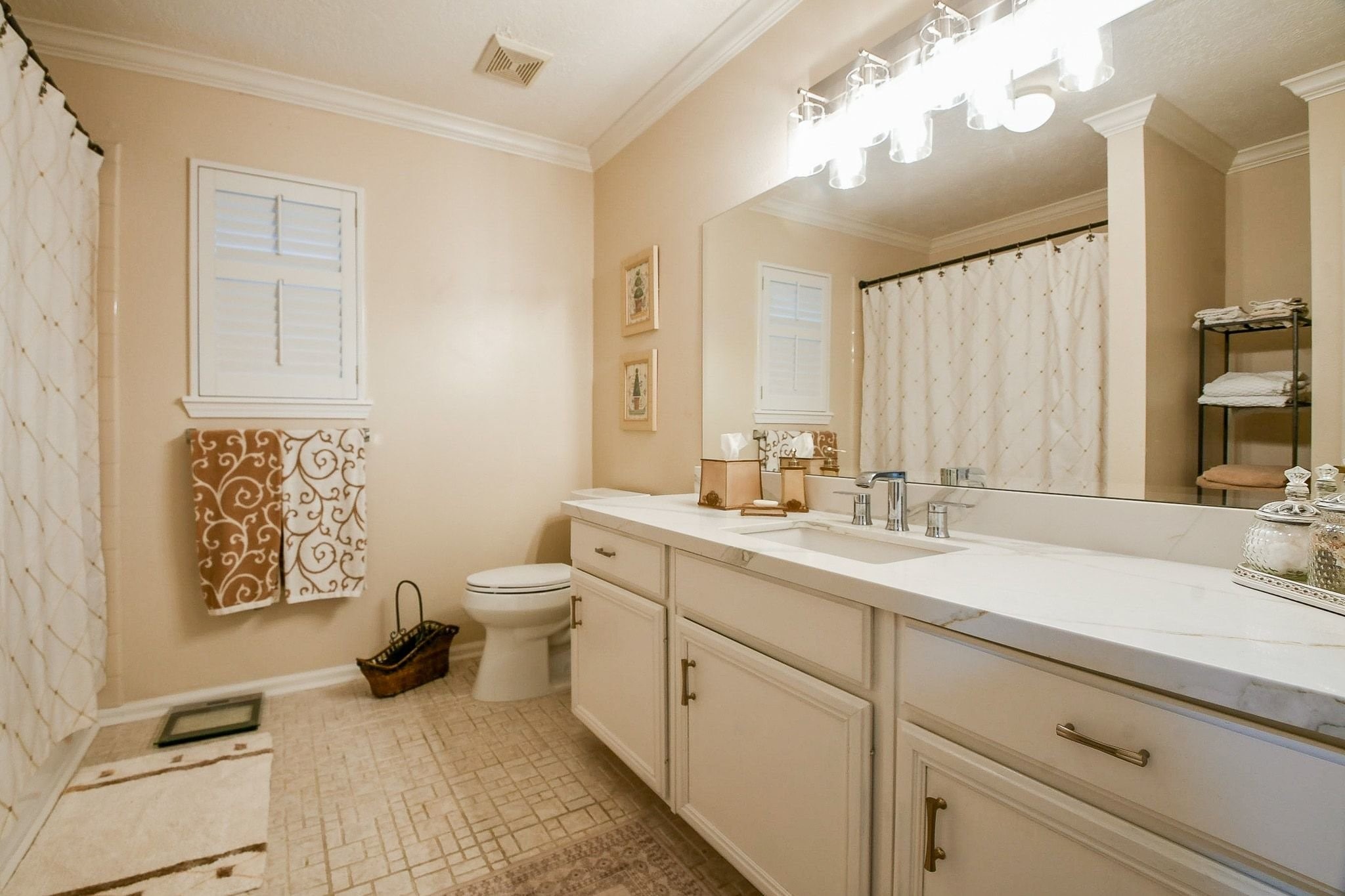 6607 Misty Springs Lane Spring, TX 77379 - Photo 21 of 31 The hall bath is perfectly situated between the four upstairs bedrooms for ultimate convenience.