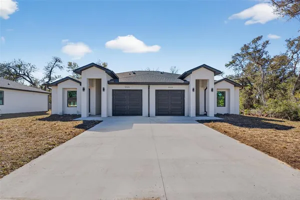 a view of a house with a patio