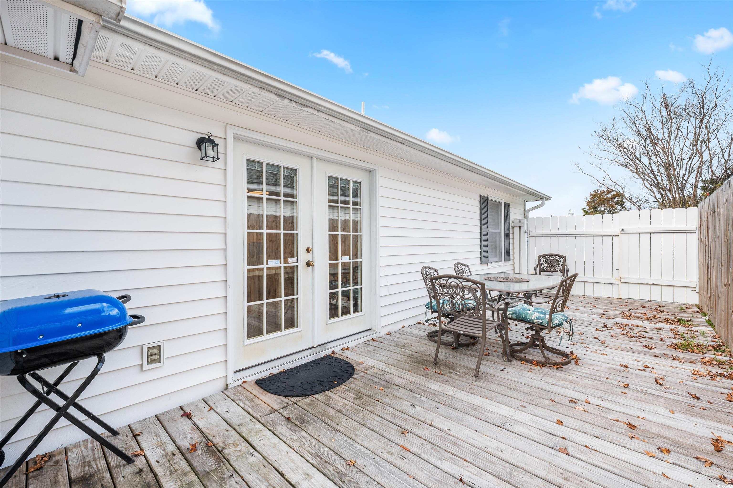 1644 Stuart Square Circle Myrtle Beach, SC 29577 - Photo 20 of 21 Wooden terrace featuring area for grilling and french doors