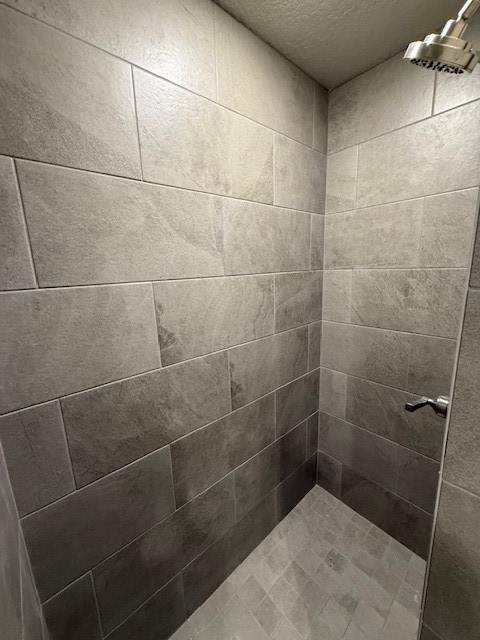1031 South Anderson Street Angleton, TX 77515 - Photo 14 of 20 a bathroom with a shower
