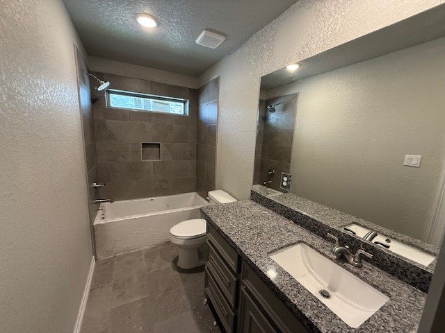 1031 South Anderson Street Angleton, TX 77515 - Photo 10 of 20 a bathroom with a granite countertop sink toilet and shower