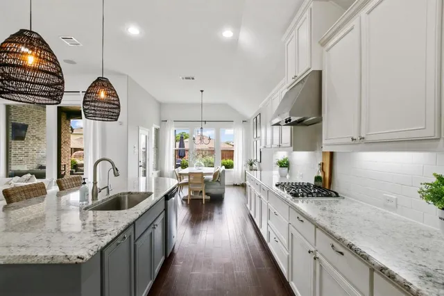 a view of a living room and hardwood floor