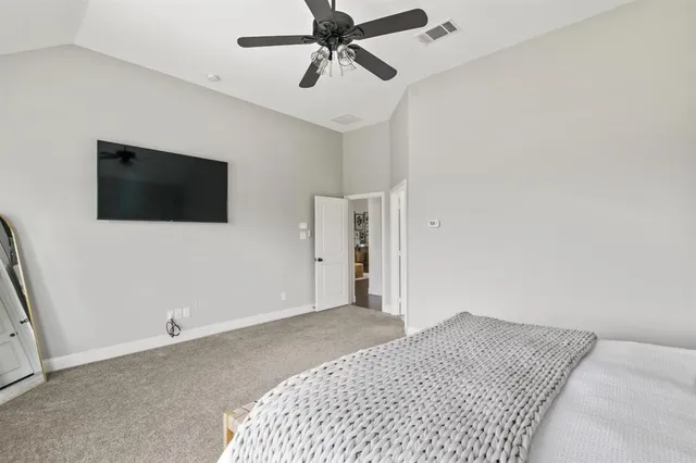 a bathroom with a tub sink shower and mirror