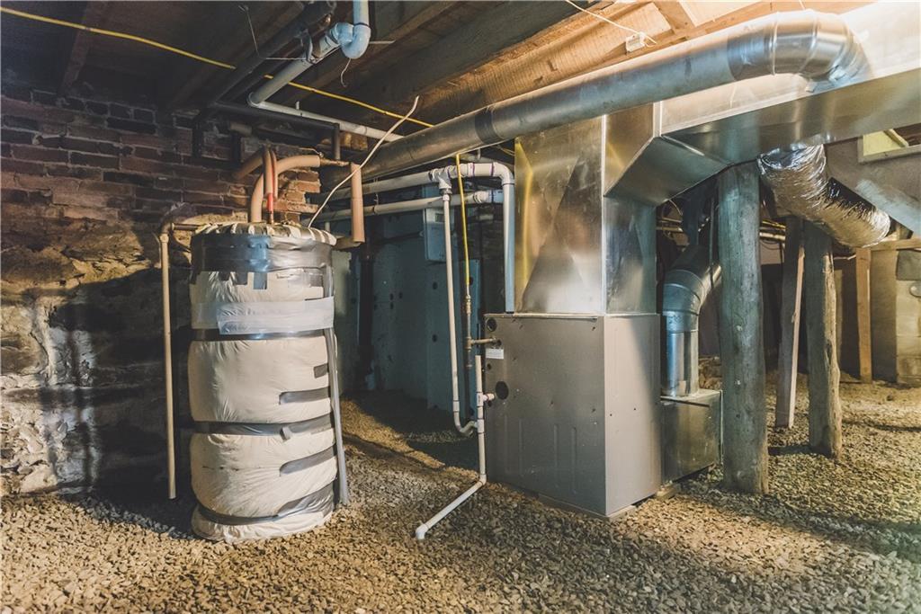 123 Gordon Hill Road Thorndike, ME 04986 - Photo 12 of 20 basement, showing heating system