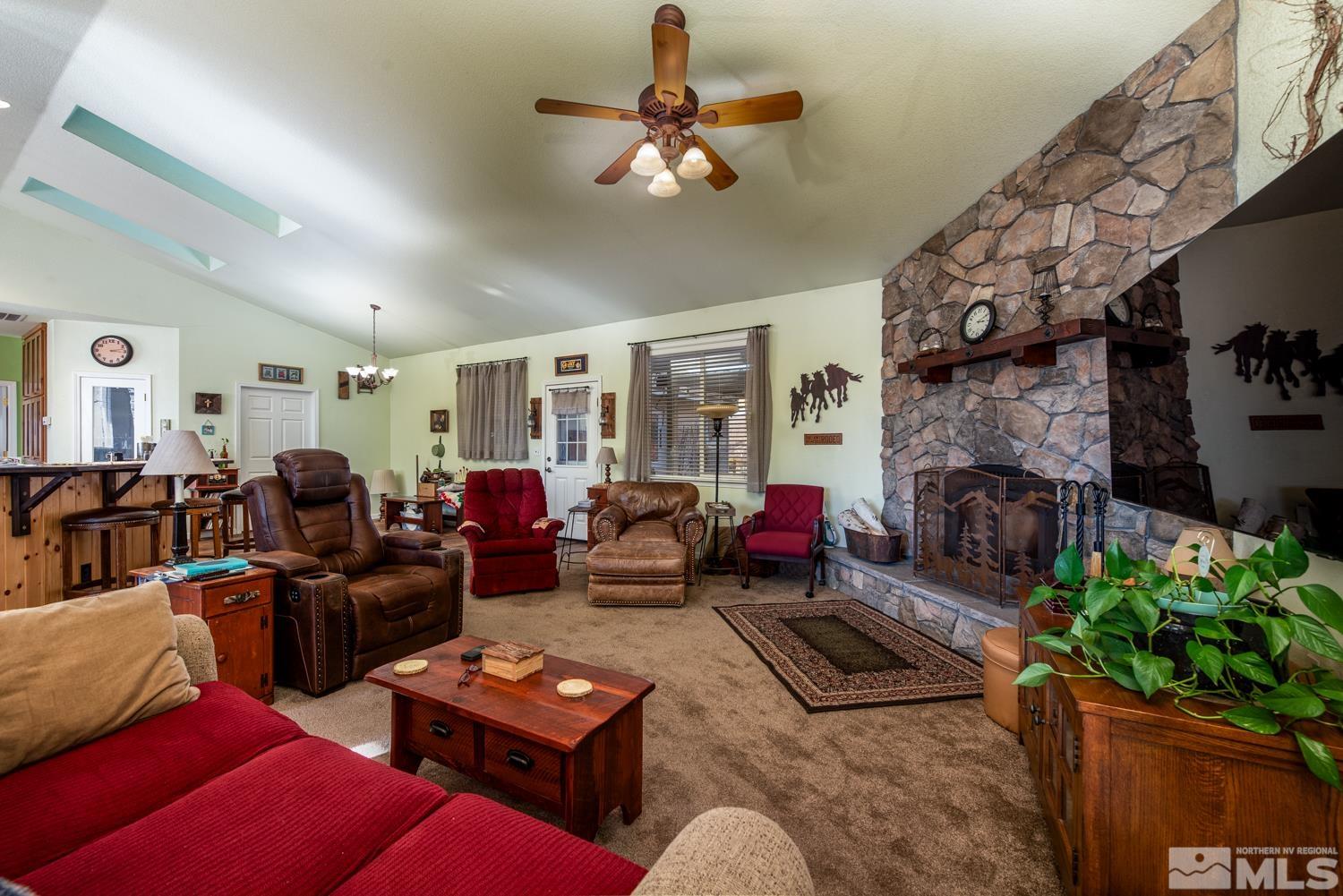 1480 Johnson Lane Minden, NV 89423 - Photo 14 of 31 a living room with furniture flower pot and a fireplace