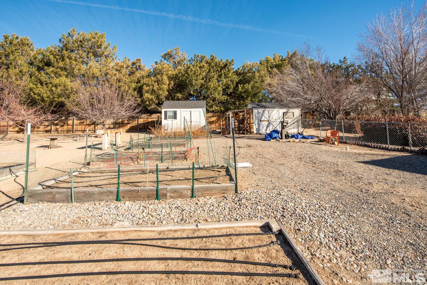 1480 Johnson Lane Minden, NV 89423 - Photo 25 of 31 a view of a yard and front view of a house