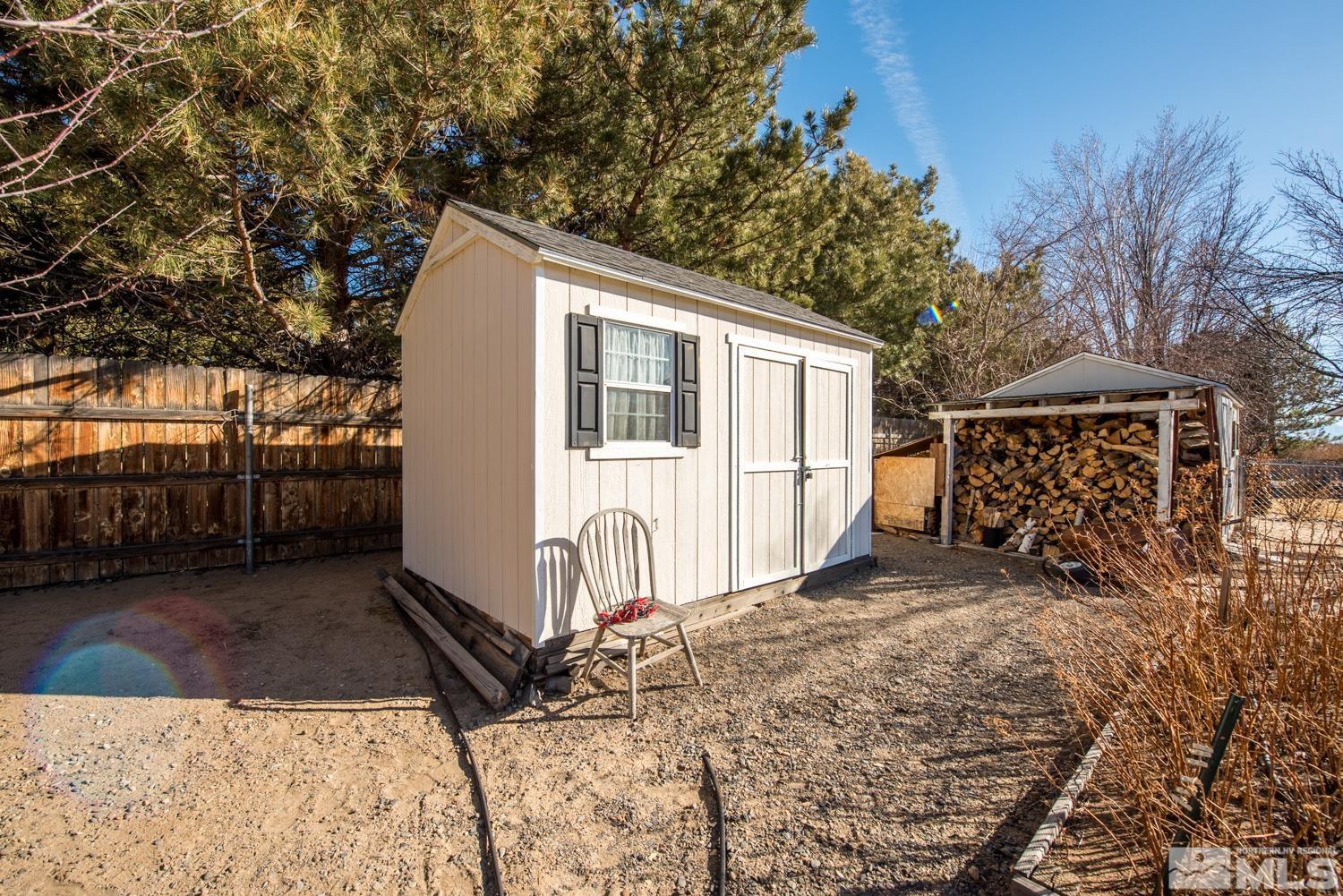 1480 Johnson Lane Minden, NV 89423 - Photo 28 of 31 a view of a house with a yard