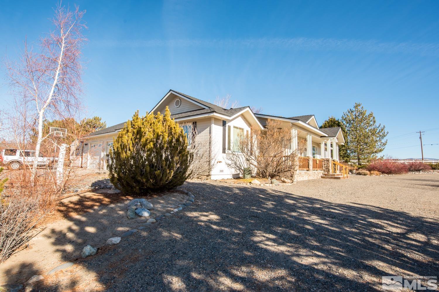 1480 Johnson Lane Minden, NV 89423 - Photo 30 of 31 a view of a house with a yard