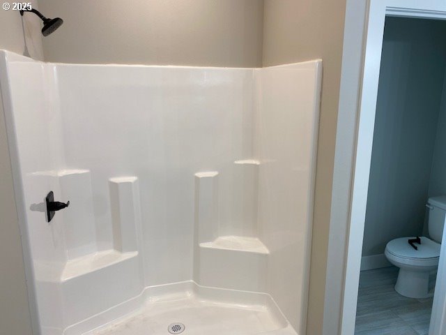 11645 Sawgrass Place Nehalem, OR 97131 - Photo 11 of 40 a bathroom with a shower and a toilet