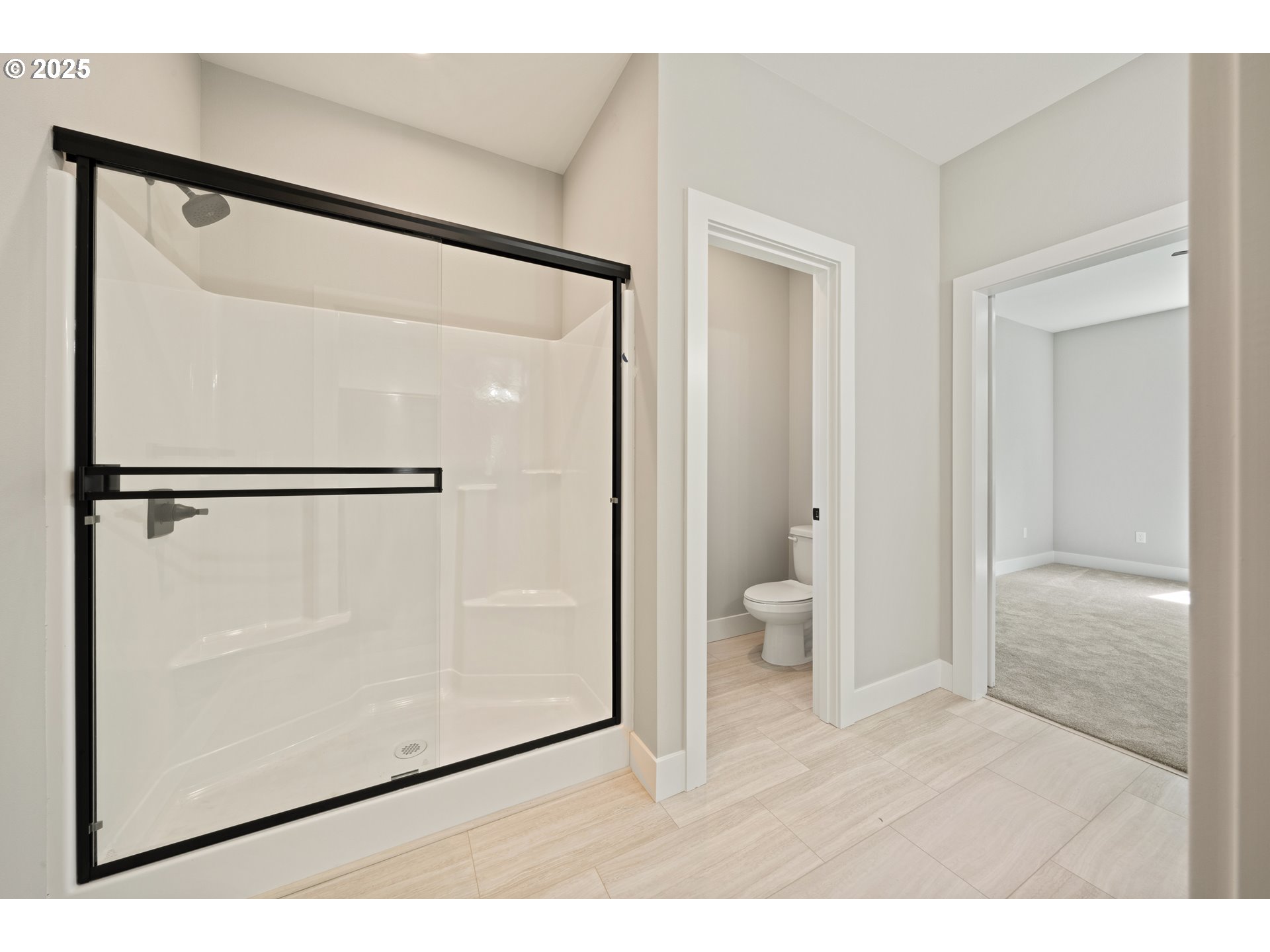 11645 Sawgrass Place Nehalem, OR 97131 - Photo 17 of 40 a bathroom with a glass shower door