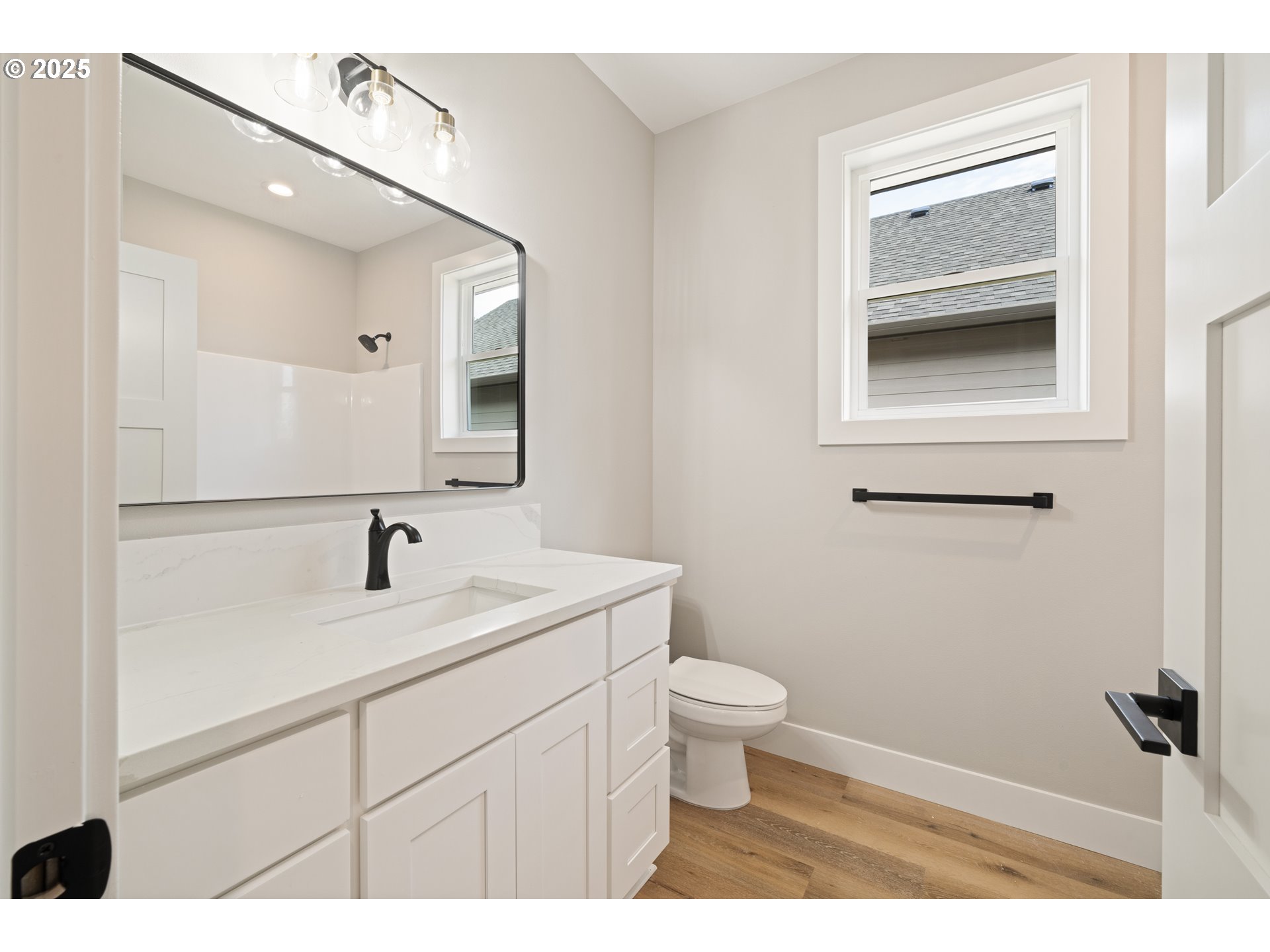 11645 Sawgrass Place Nehalem, OR 97131 - Photo 23 of 40 a bathroom with a sink a toilet and mirror