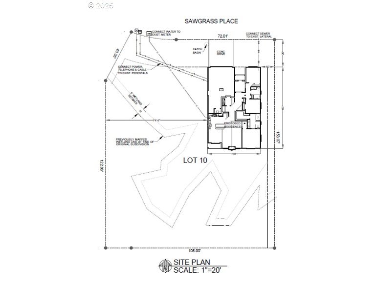 11645 Sawgrass Place Nehalem, OR 97131 - Photo 3 of 40 a picture of a room with a white wall and a painting
