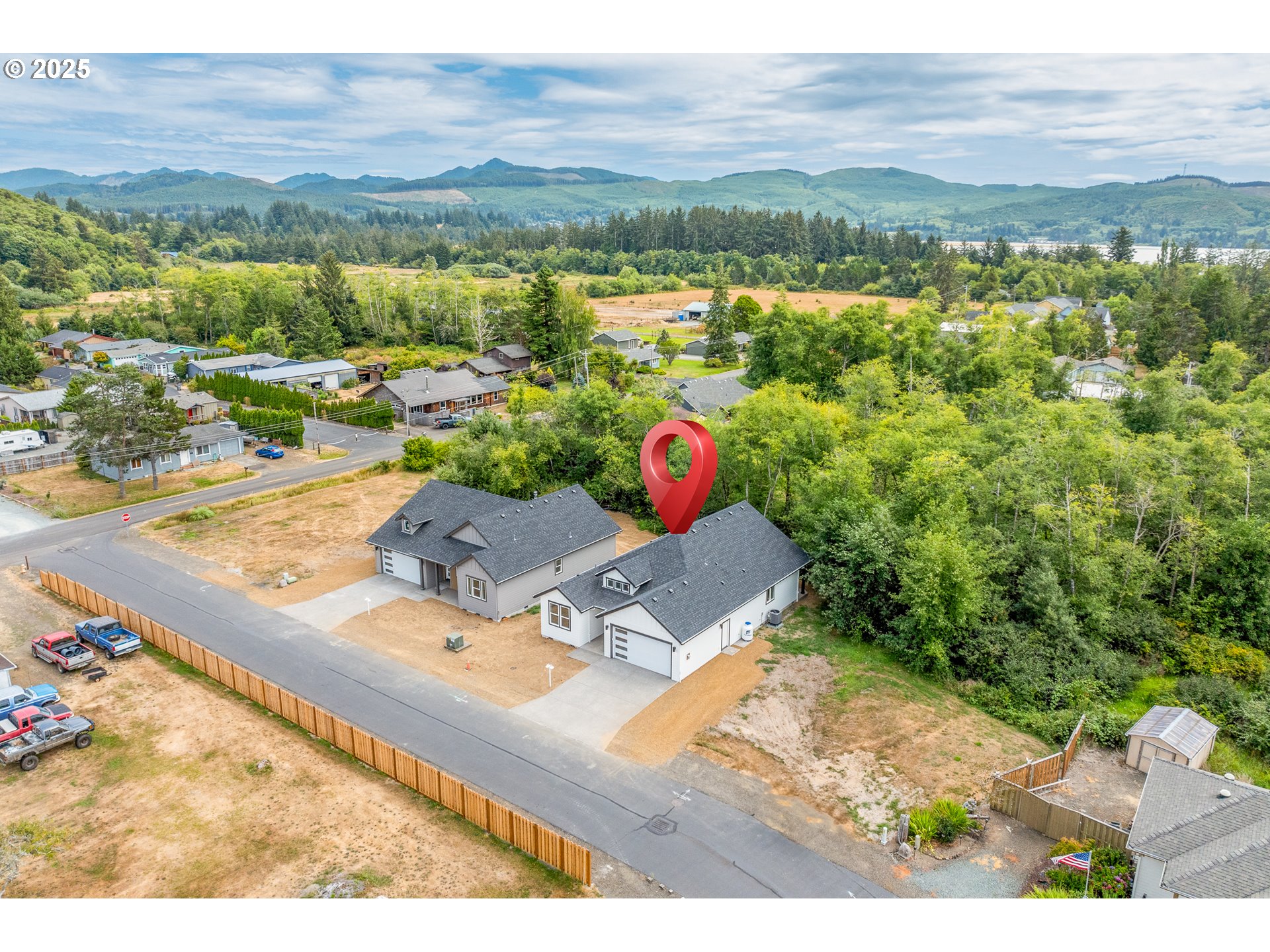 11645 Sawgrass Place Nehalem, OR 97131 - Photo 31 of 40 an aerial view of a house with a yard
