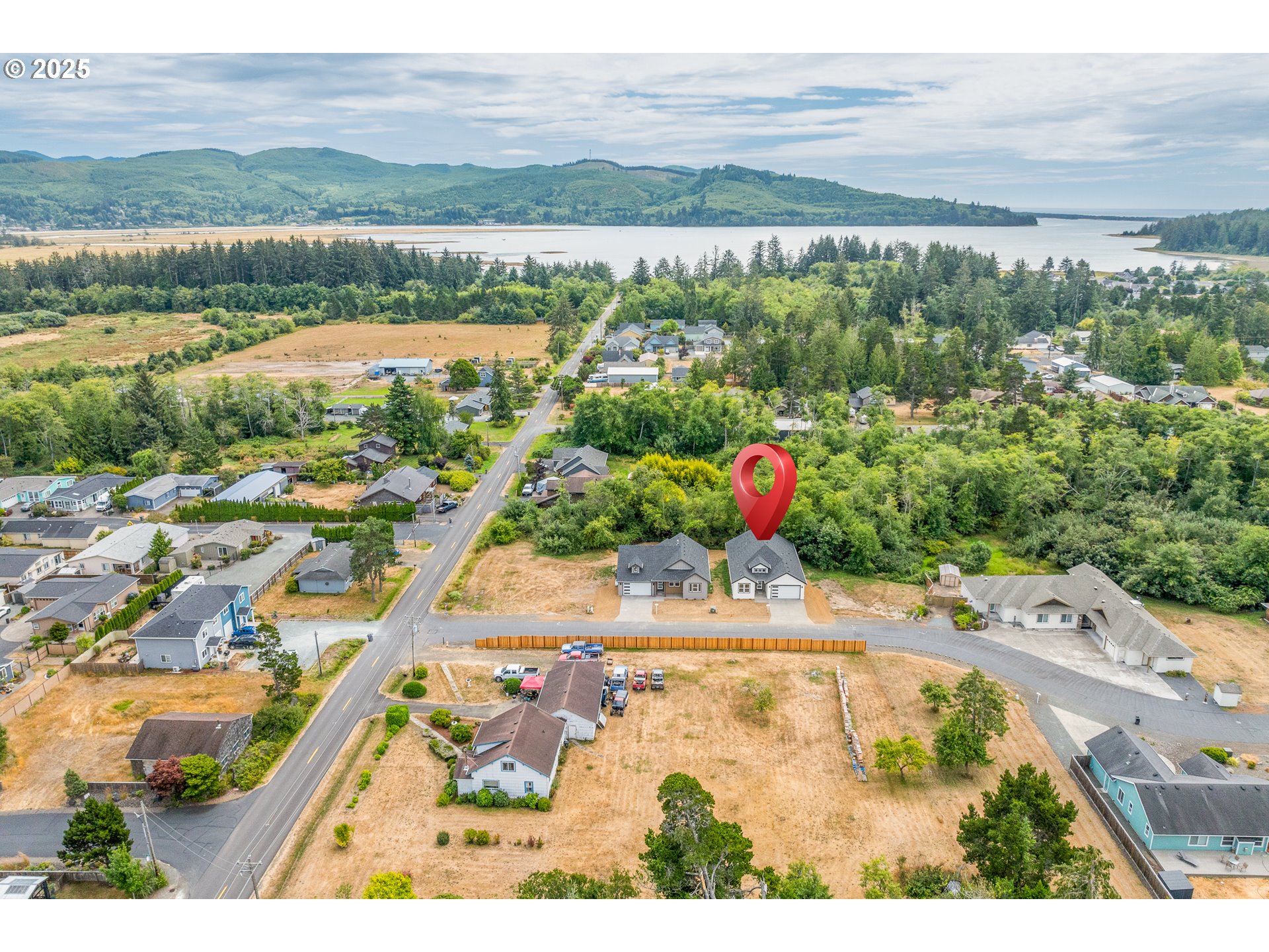 11645 Sawgrass Place Nehalem, OR 97131 - Photo 33 of 40 a view of a city with an ocean view