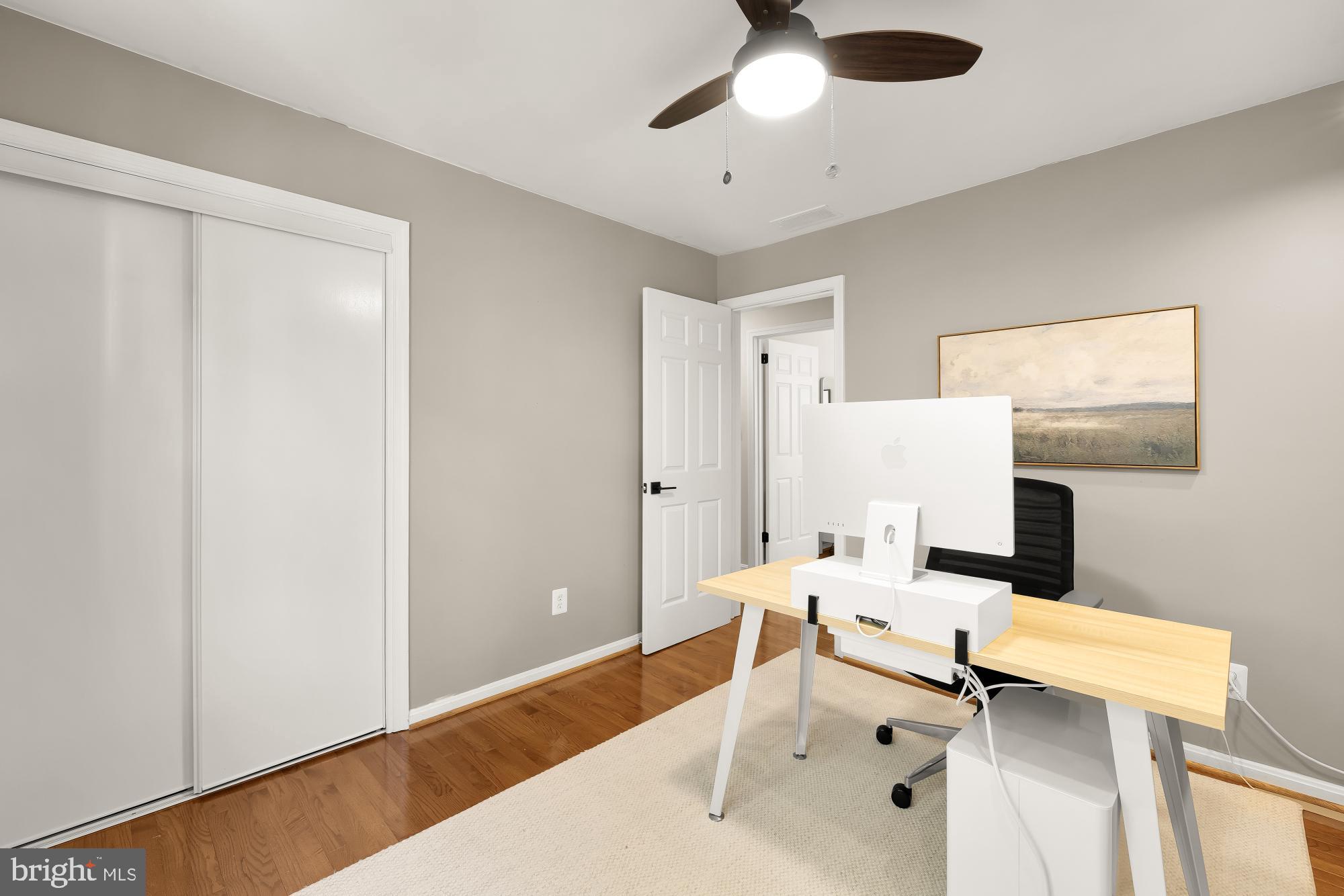 6723 Fairfax Road, Unit 15 Chevy Chase, MD 20815 - Photo 26 of 43 a work room with table and chairs