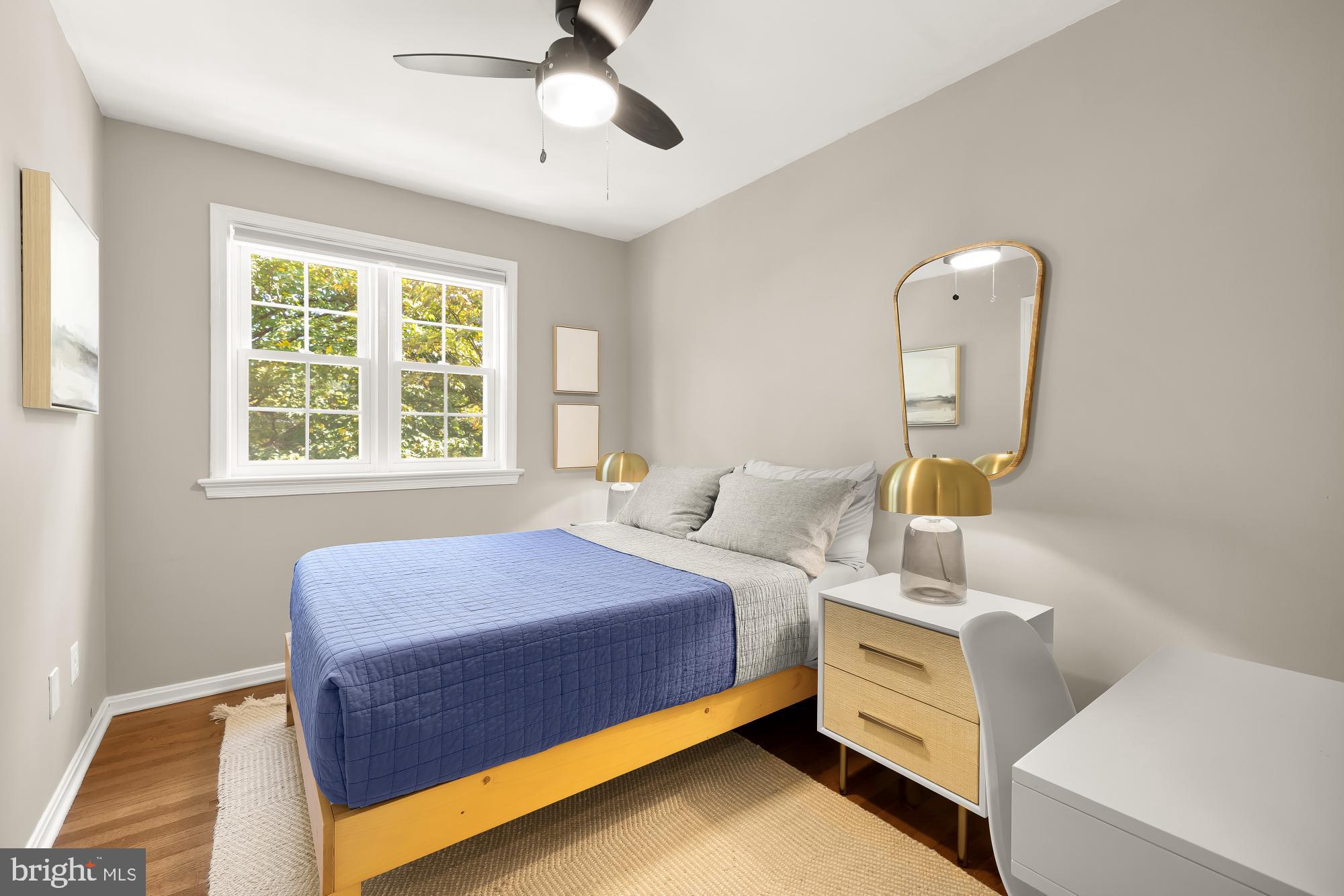 6723 Fairfax Road, Unit 15 Chevy Chase, MD 20815 - Photo 27 of 43 a bedroom with a bed and a window