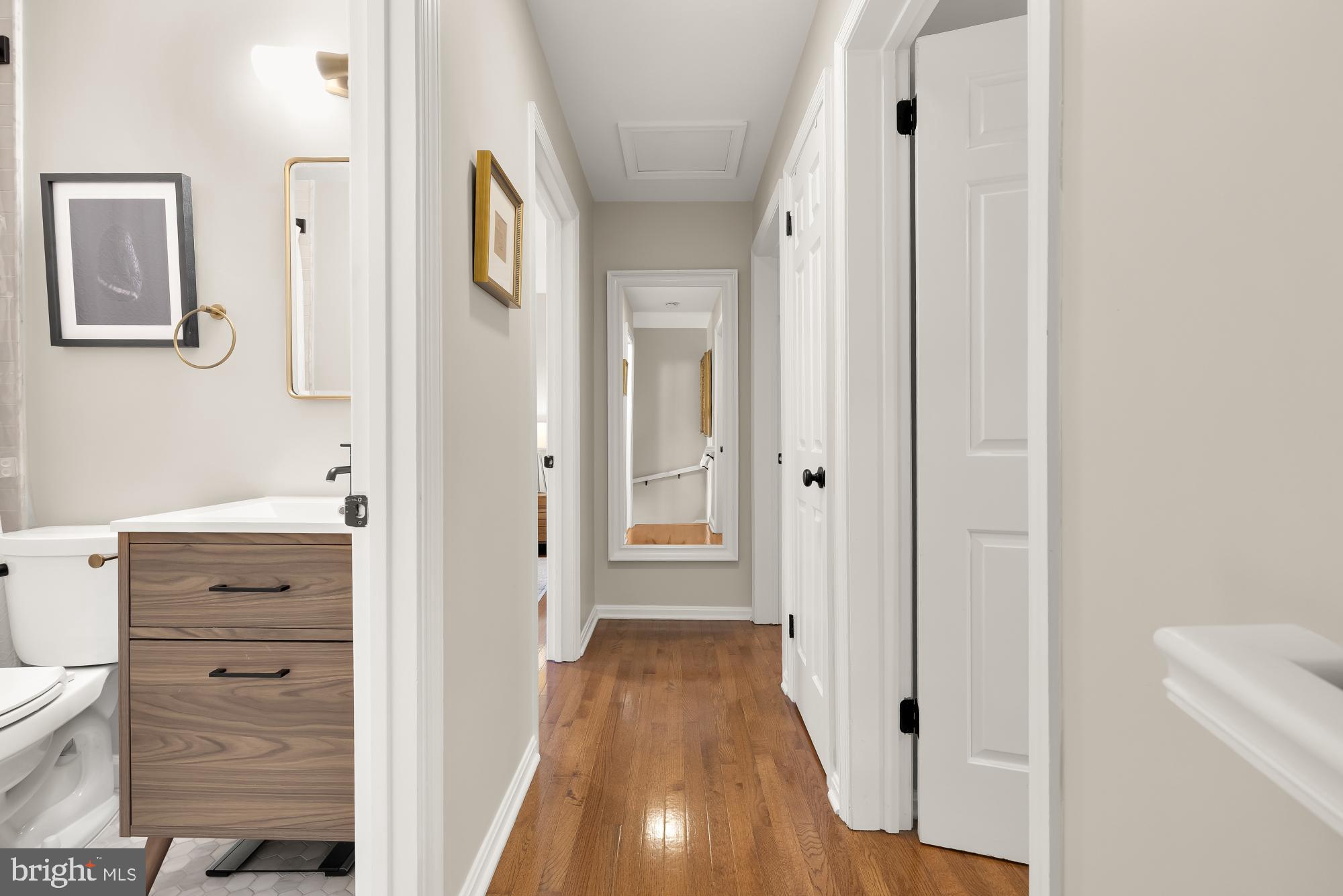 6723 Fairfax Road, Unit 15 Chevy Chase, MD 20815 - Photo 30 of 43 a view of a hallway with wooden floor and closet