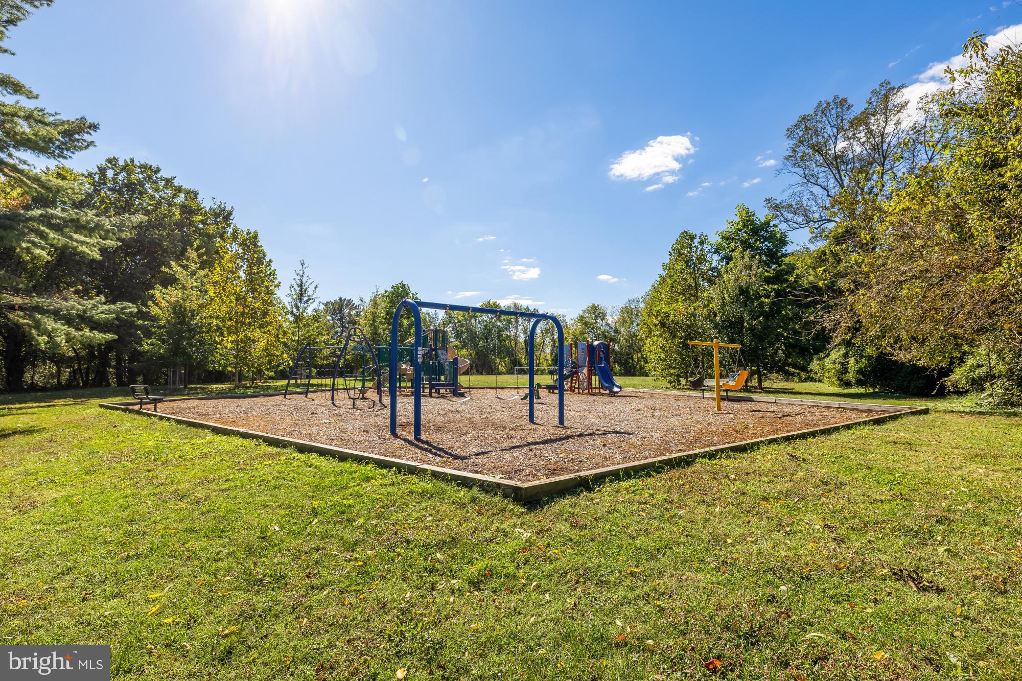 6723 Fairfax Road, Unit 15 Chevy Chase, MD 20815 - Photo 40 of 43 a view of a swimming pool with a yard