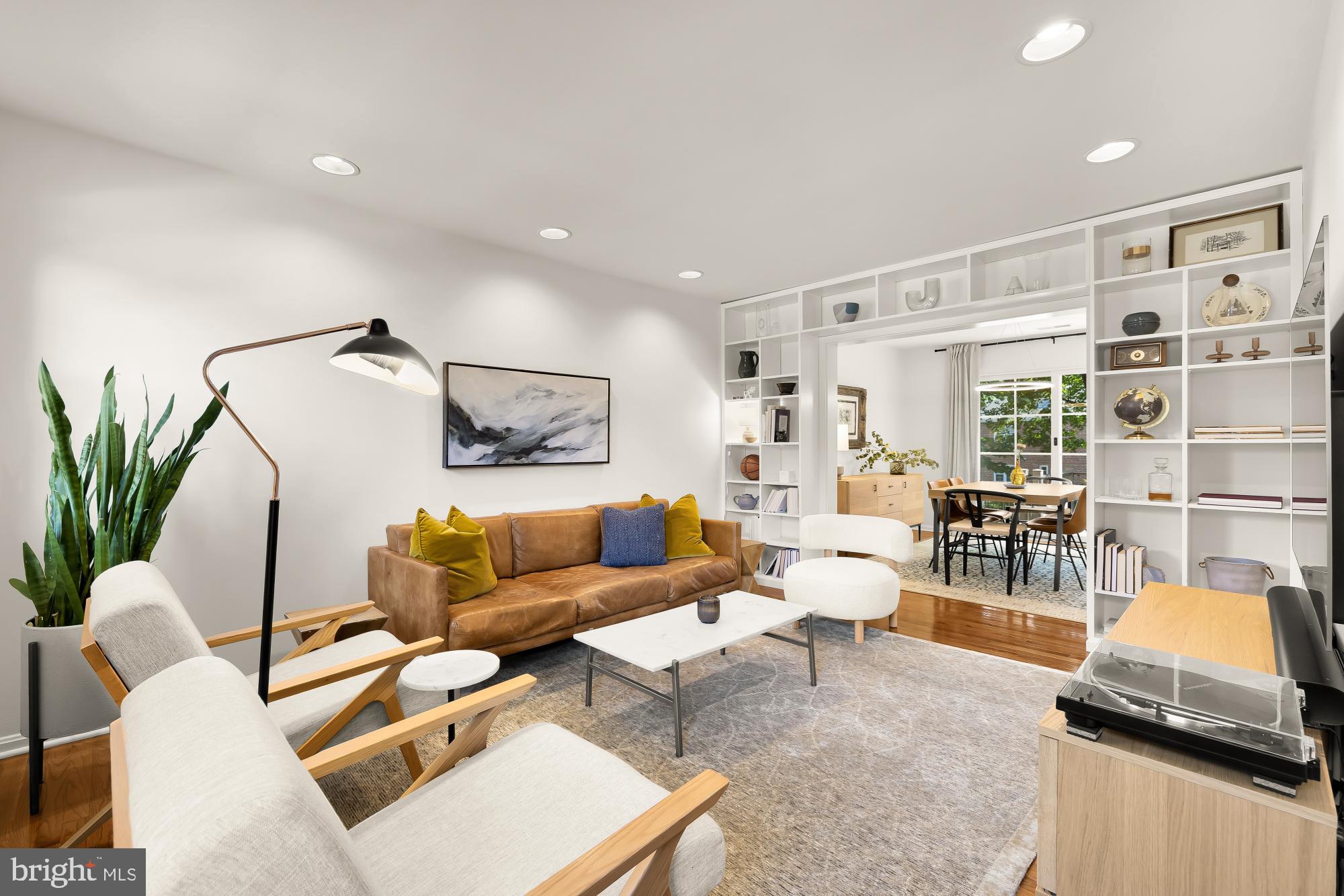 6723 Fairfax Road, Unit 15 Chevy Chase, MD 20815 - Photo 7 of 43 a living room with furniture and a couch