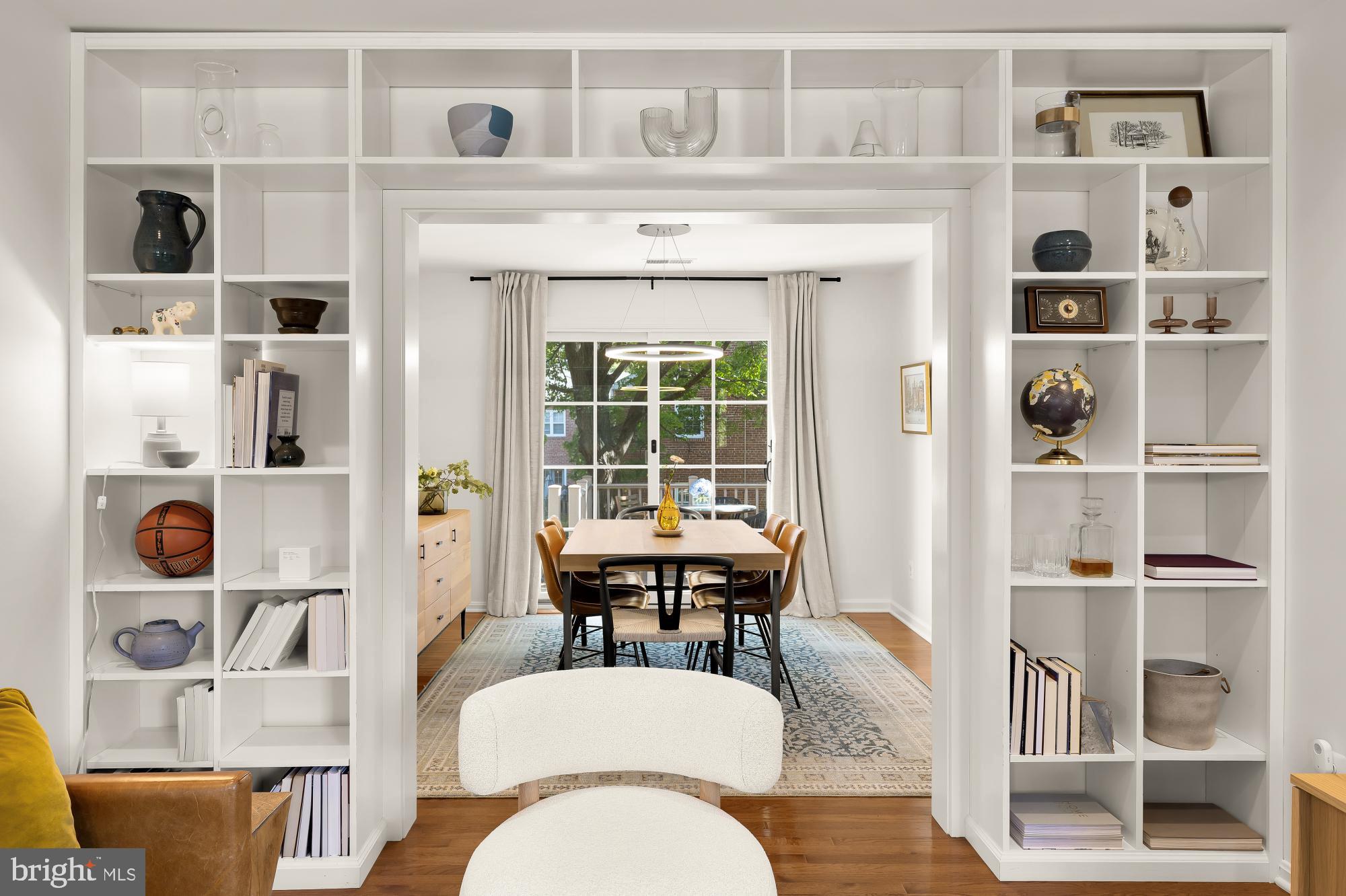 6723 Fairfax Road, Unit 15 Chevy Chase, MD 20815 - Photo 9 of 43 a living room with furniture and a window