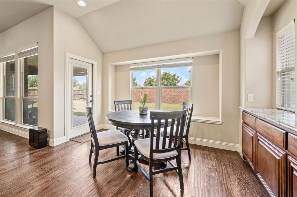 5209 Edgebrook Way Fort Worth, TX 76244 - Photo 10 of 33 a view of a dining room with furniture window and wooden floor