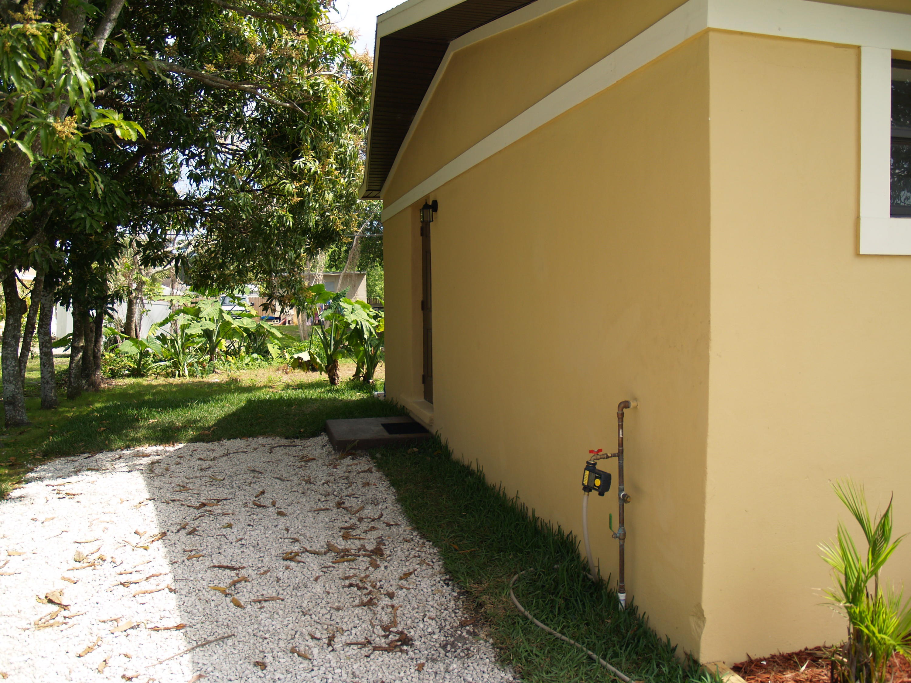 18122 Limestone Creek Road Jupiter, FL 33458 - Photo 11 of 22 Left side