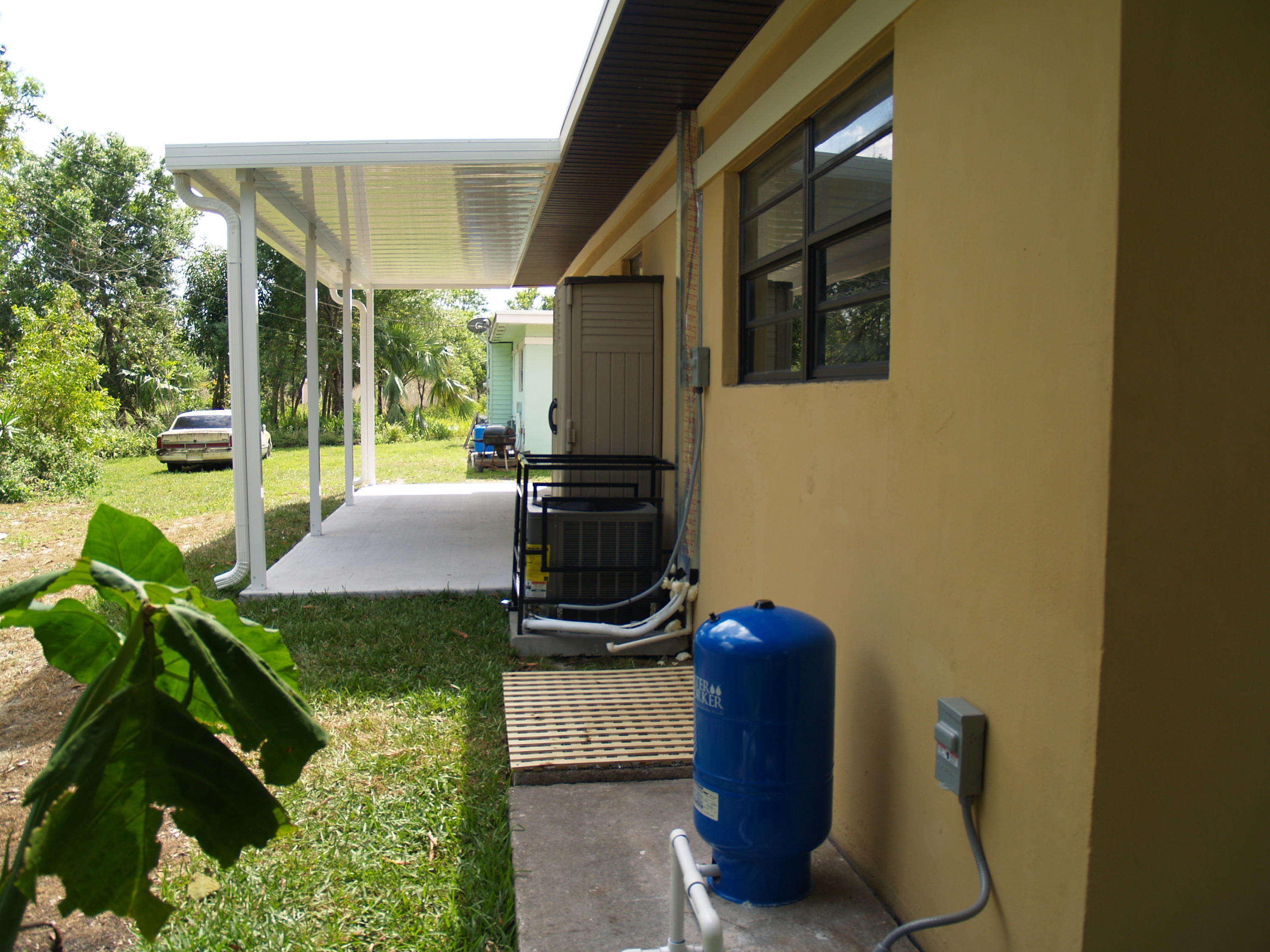 18122 Limestone Creek Road Jupiter, FL 33458 - Photo 13 of 22 Rear exterior