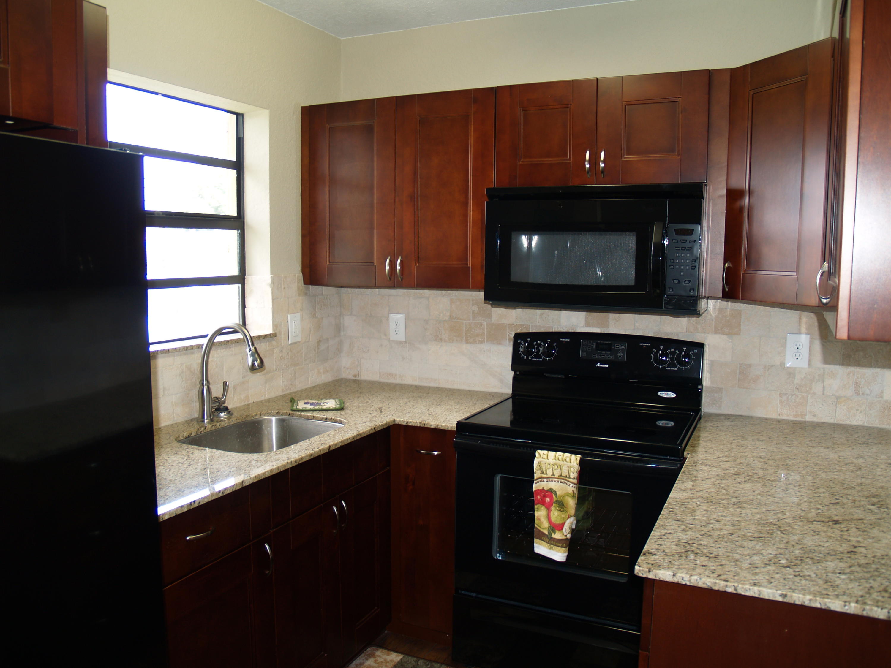 18122 Limestone Creek Road Jupiter, FL 33458 - Photo 8 of 22 Kitchen