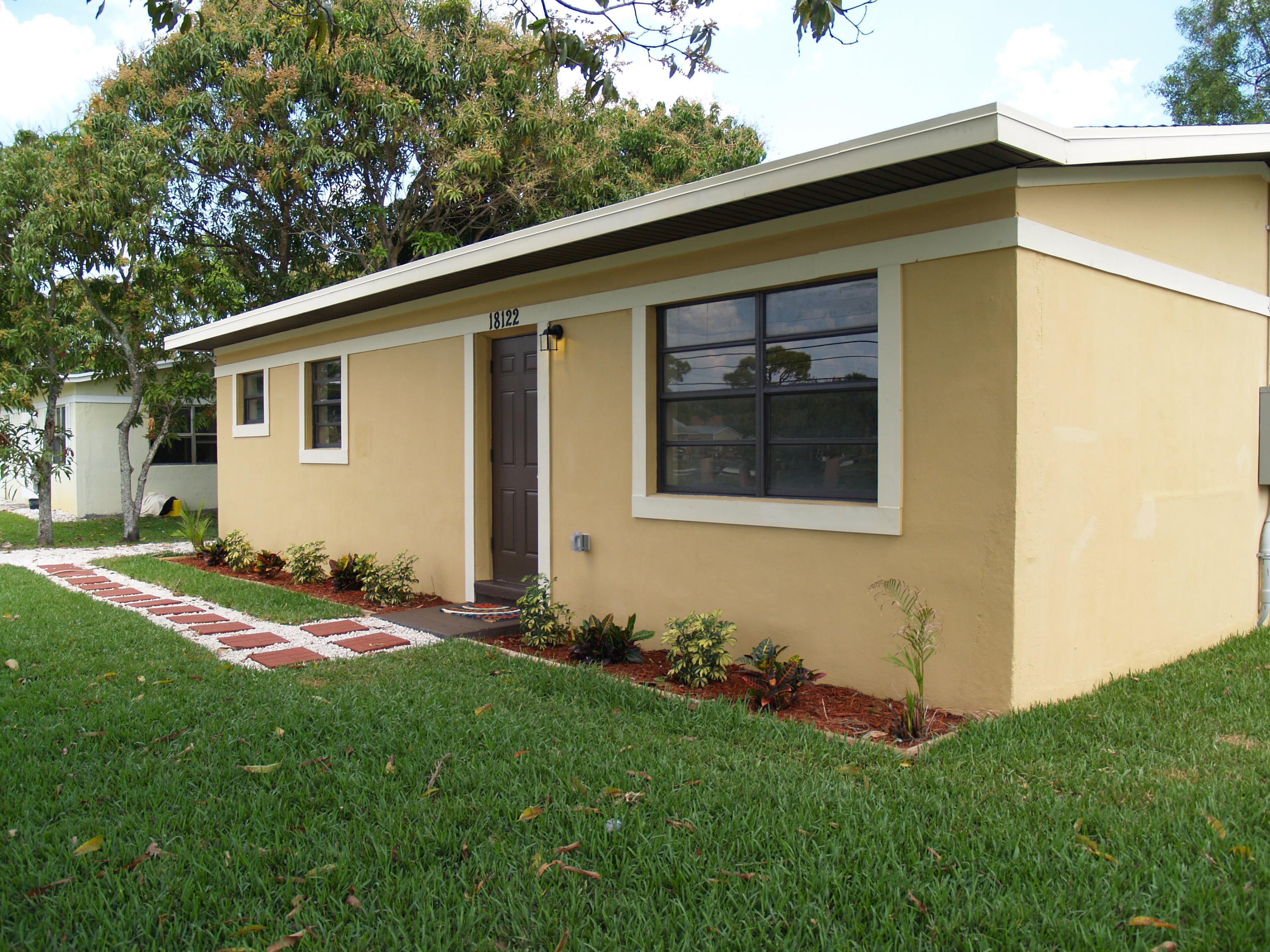 18122 Limestone Creek Road Jupiter, FL 33458 - Photo 10 of 22 Front