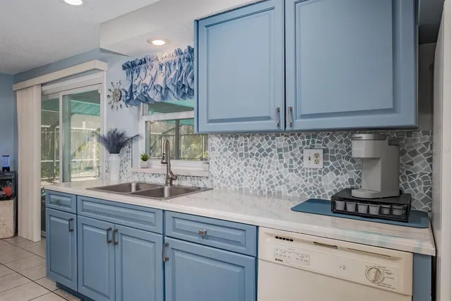 a bedroom with a bed and a flat screen tv with the outer view