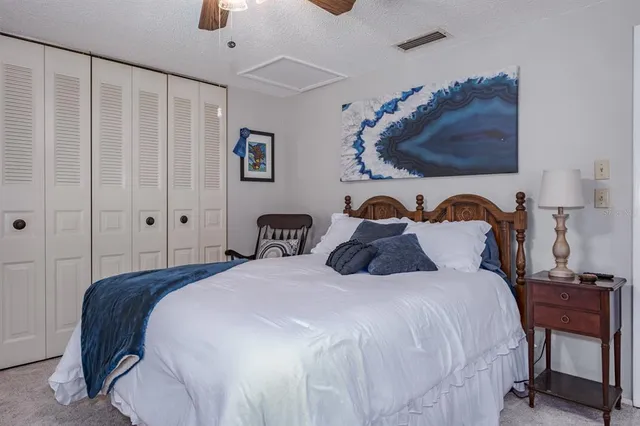 a room with furniture and a floor to ceiling window