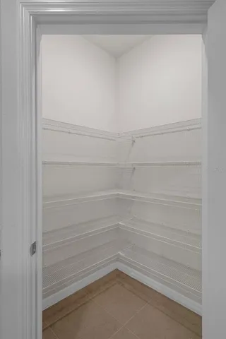 a empty closet with white paint
