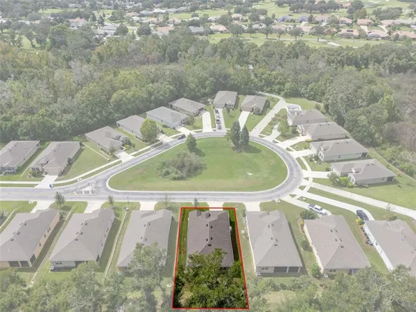 a view of a table and chairs in the patio