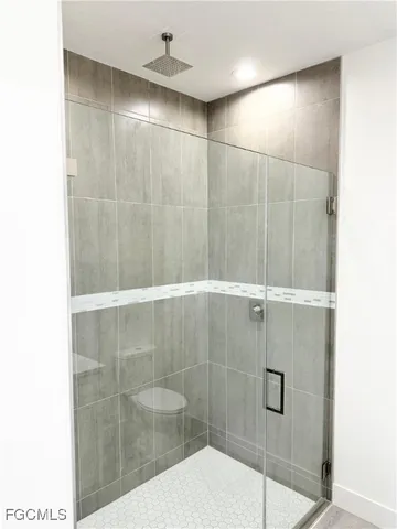 a view of a bathroom from the hallway