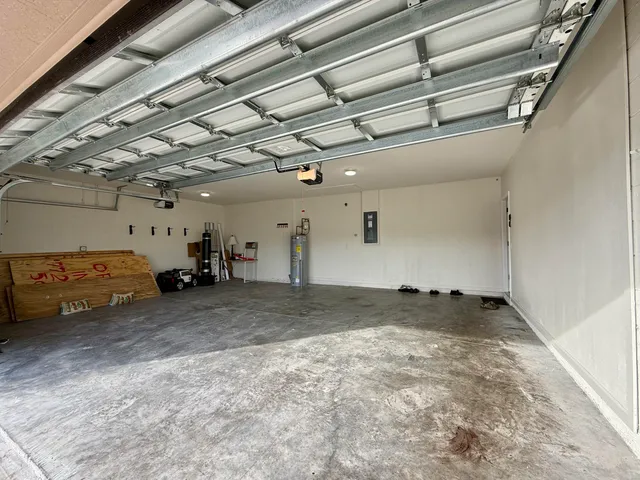 a view of parking garage with parked cars