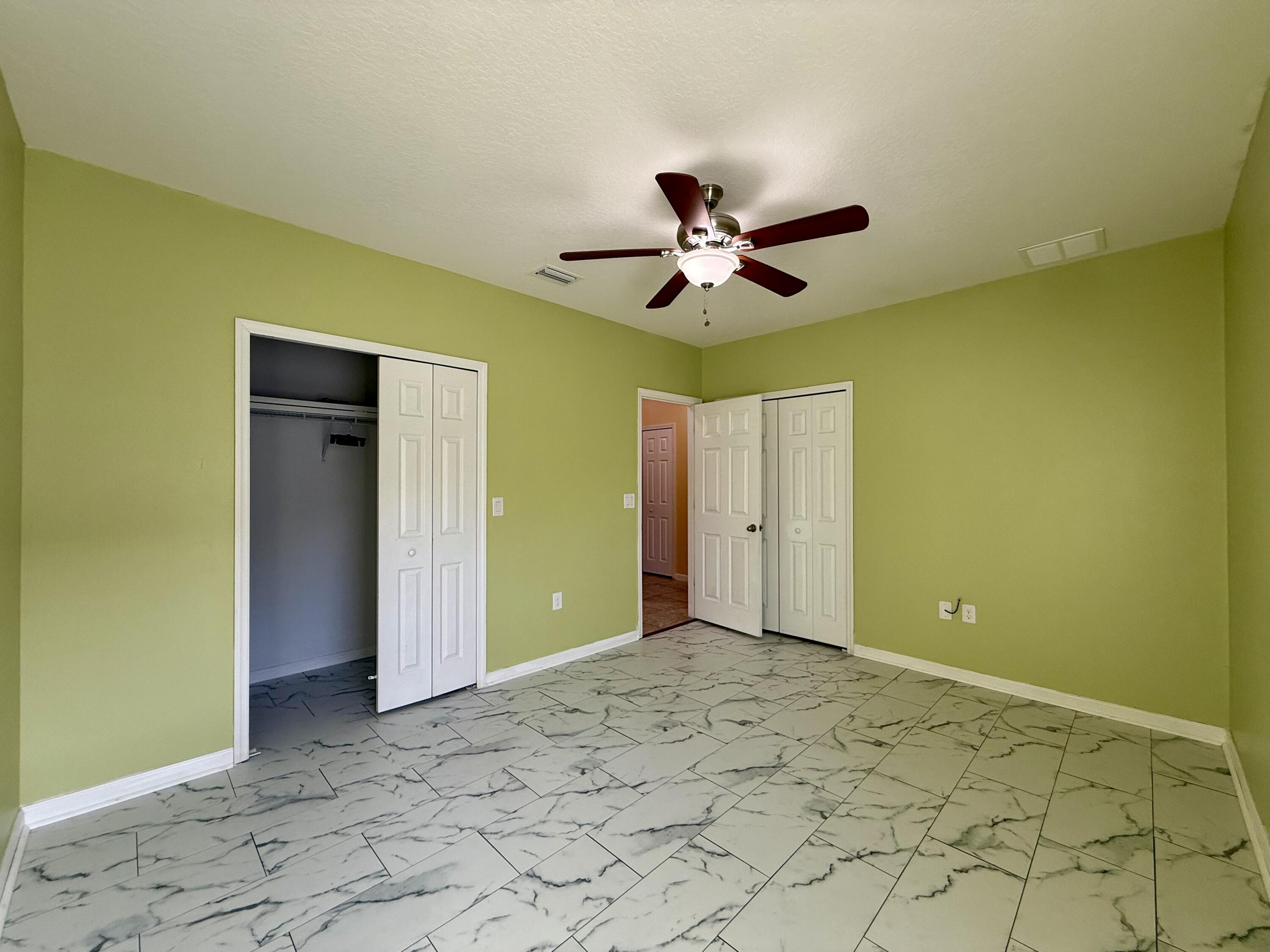 5997 Ridge Lake Circle Vero Beach, FL 32967 - Photo 6 of 14 a view of an empty room
