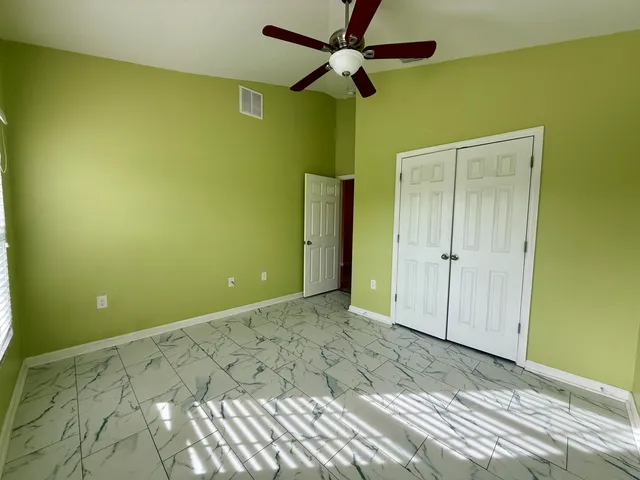 a view of a big room with wooden floor