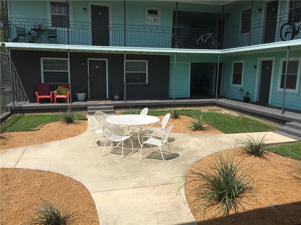 701 Elsbeth Street, Unit 201 Dallas, TX 75208 - Photo 13 of 14 a view of a swimming pool with a lounge chair