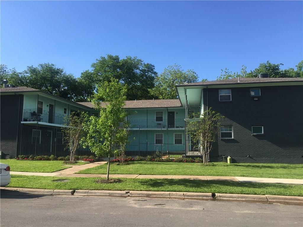 701 Elsbeth Street, Unit 201 Dallas, TX 75208 - Photo 2 of 14 a front view of a house with a yard