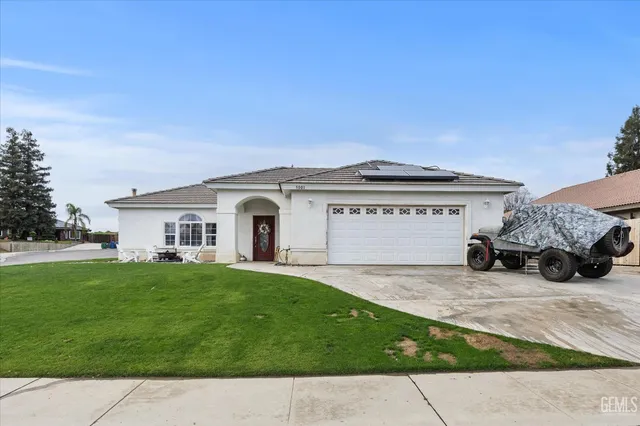 a view of a house with a patio