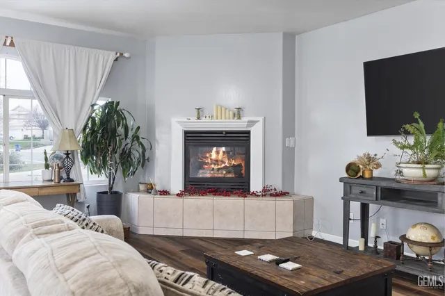a view of a dining room with furniture and chandelier