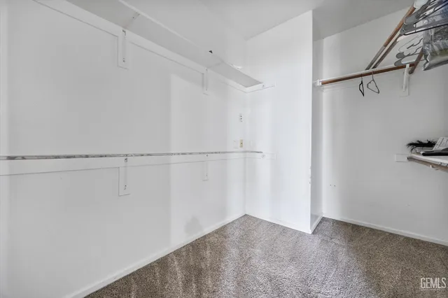 a bathroom with 2 sink and a mirror