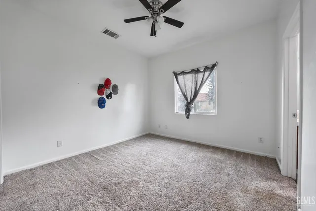 a bathroom with a toilet and a bathtub
