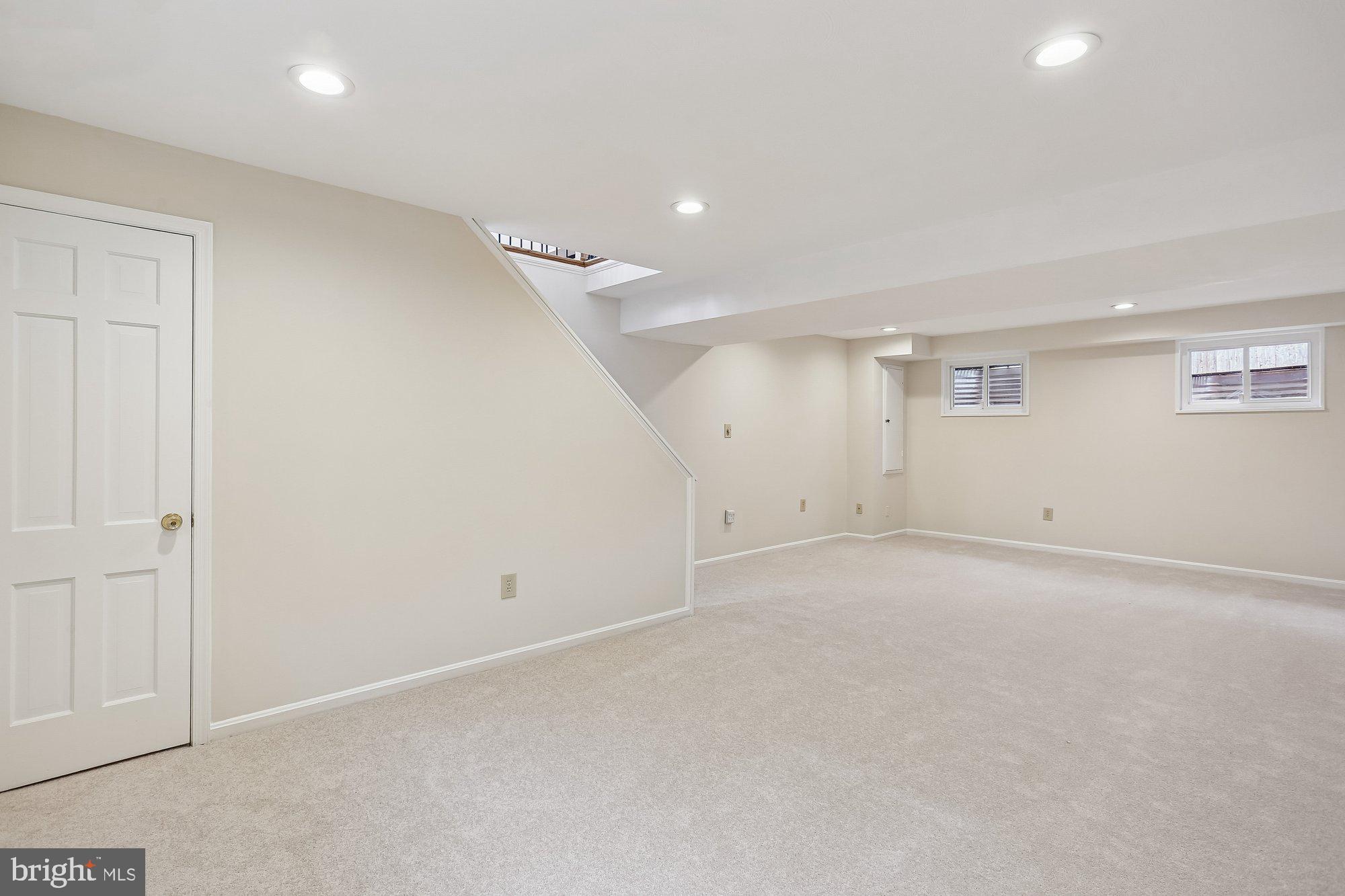 513 Beaumont Road Silver Spring, MD 20904 - Photo 28 of 58 Family Room. Door to Large Closet & Crawl Space